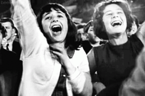 gif of girls fangirling during beatlemania