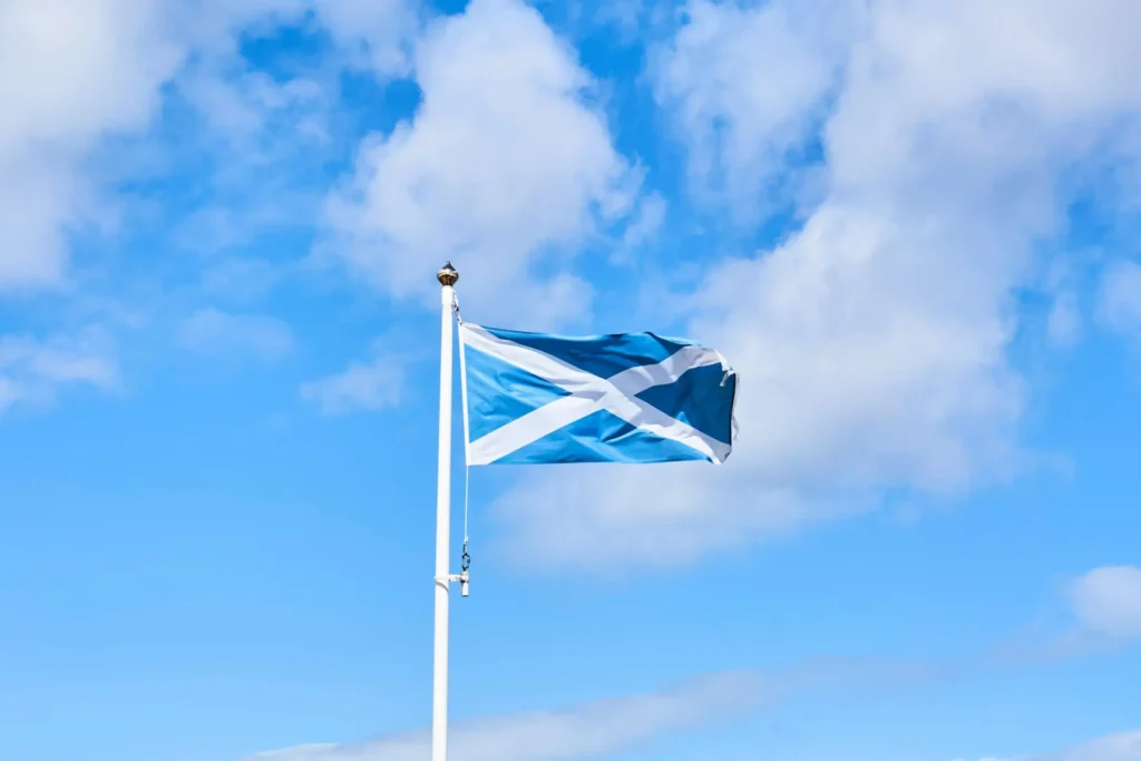 The blue-and-white Scottish flag flying in the wind